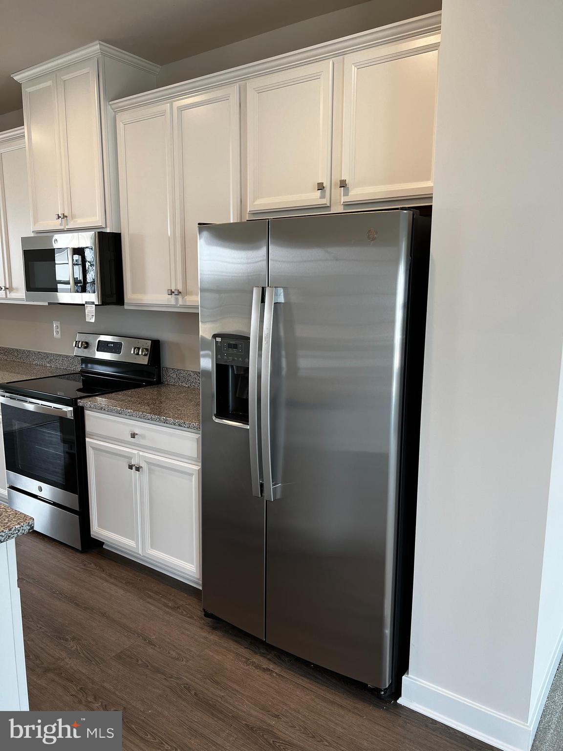 913 Ericcson Lane Middletown, DE 19709 - Photo 18 of 50 a kitchen with stainless steel appliances a refrigerator stove and sink