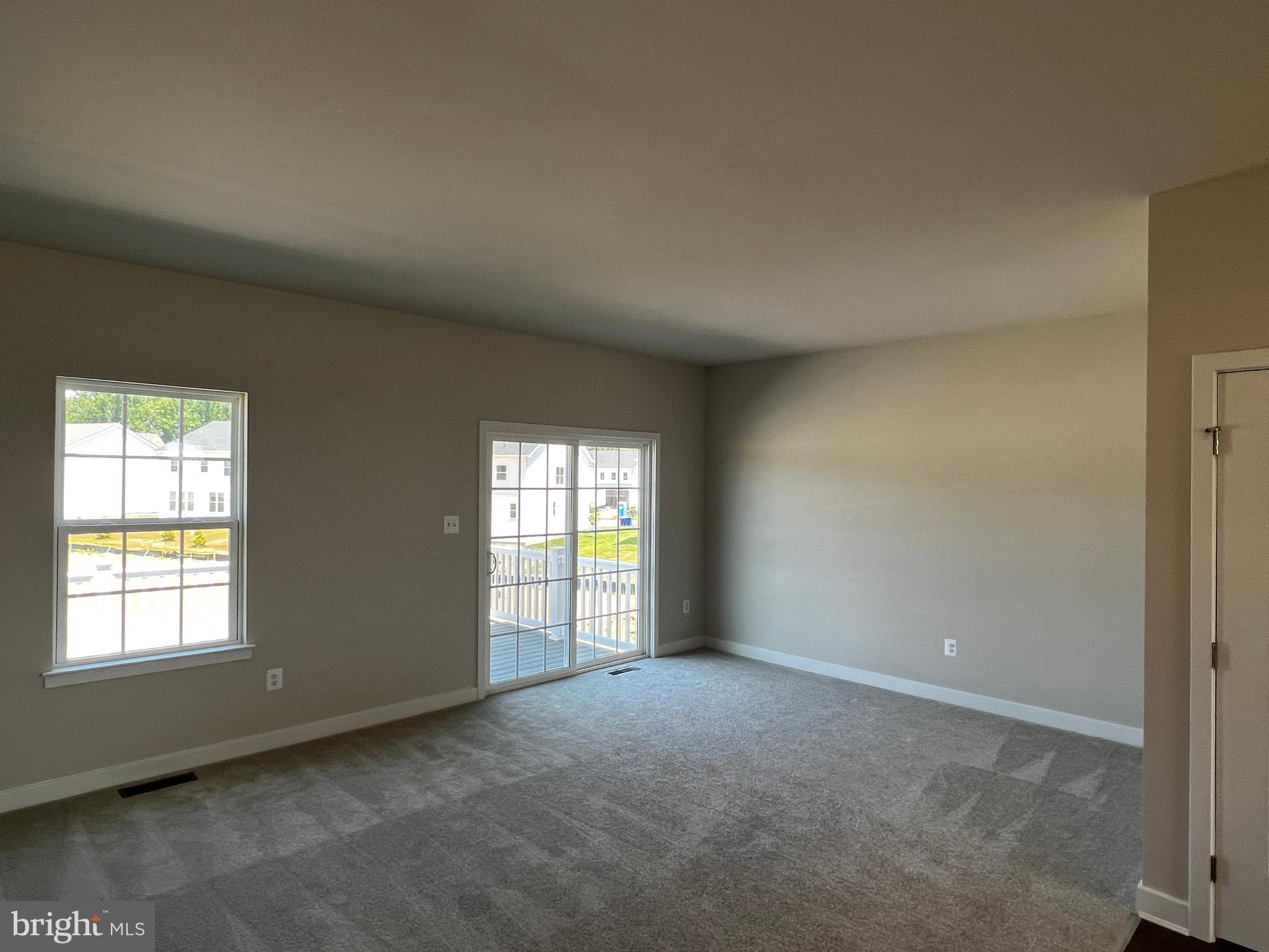 913 Ericcson Lane Middletown, DE 19709 - Photo 23 of 50 an empty room with windows
