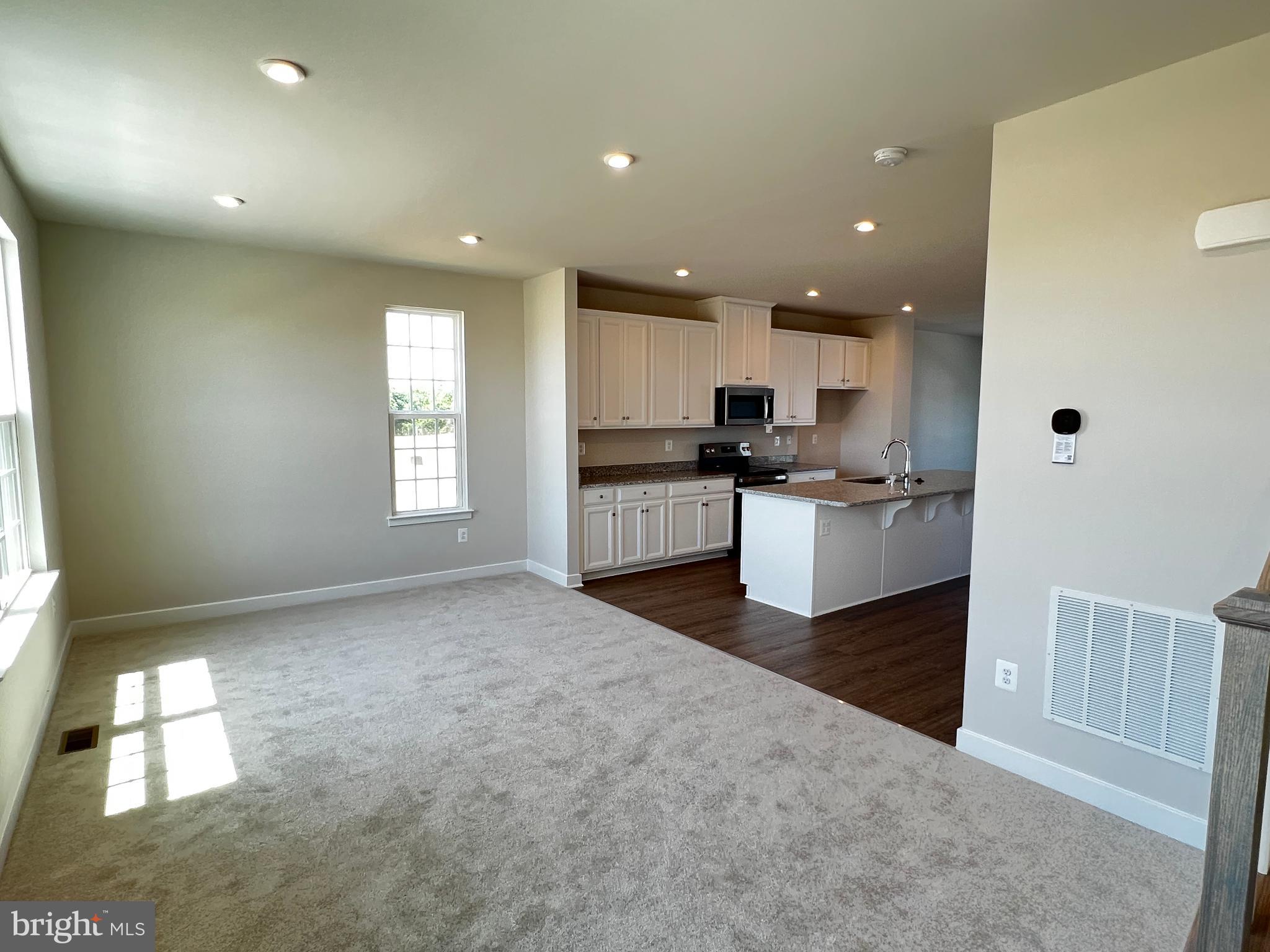 913 Ericcson Lane Middletown, DE 19709 - Photo 28 of 50 a kitchen with a sink and a stove top oven