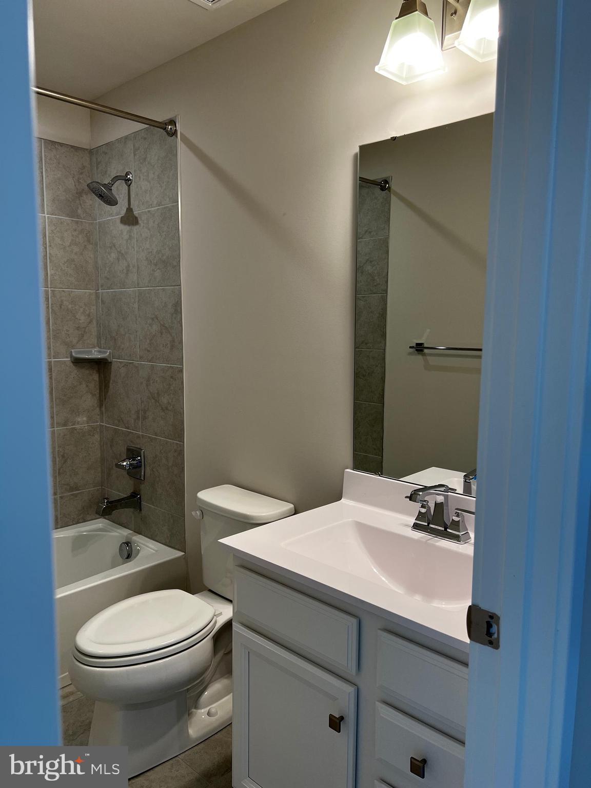 913 Ericcson Lane Middletown, DE 19709 - Photo 42 of 50 a bathroom with a sink a toilet and shower