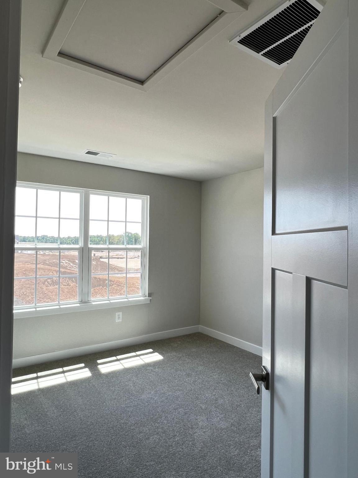 913 Ericcson Lane Middletown, DE 19709 - Photo 45 of 50 a view of an empty room with a window