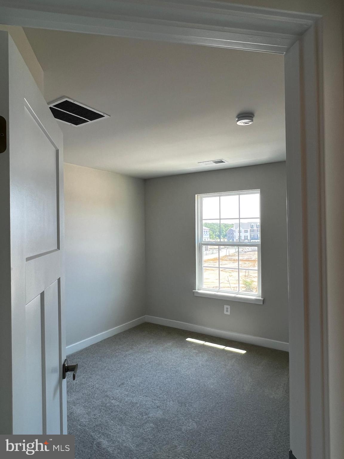 913 Ericcson Lane Middletown, DE 19709 - Photo 47 of 50 a view of an empty room with a window