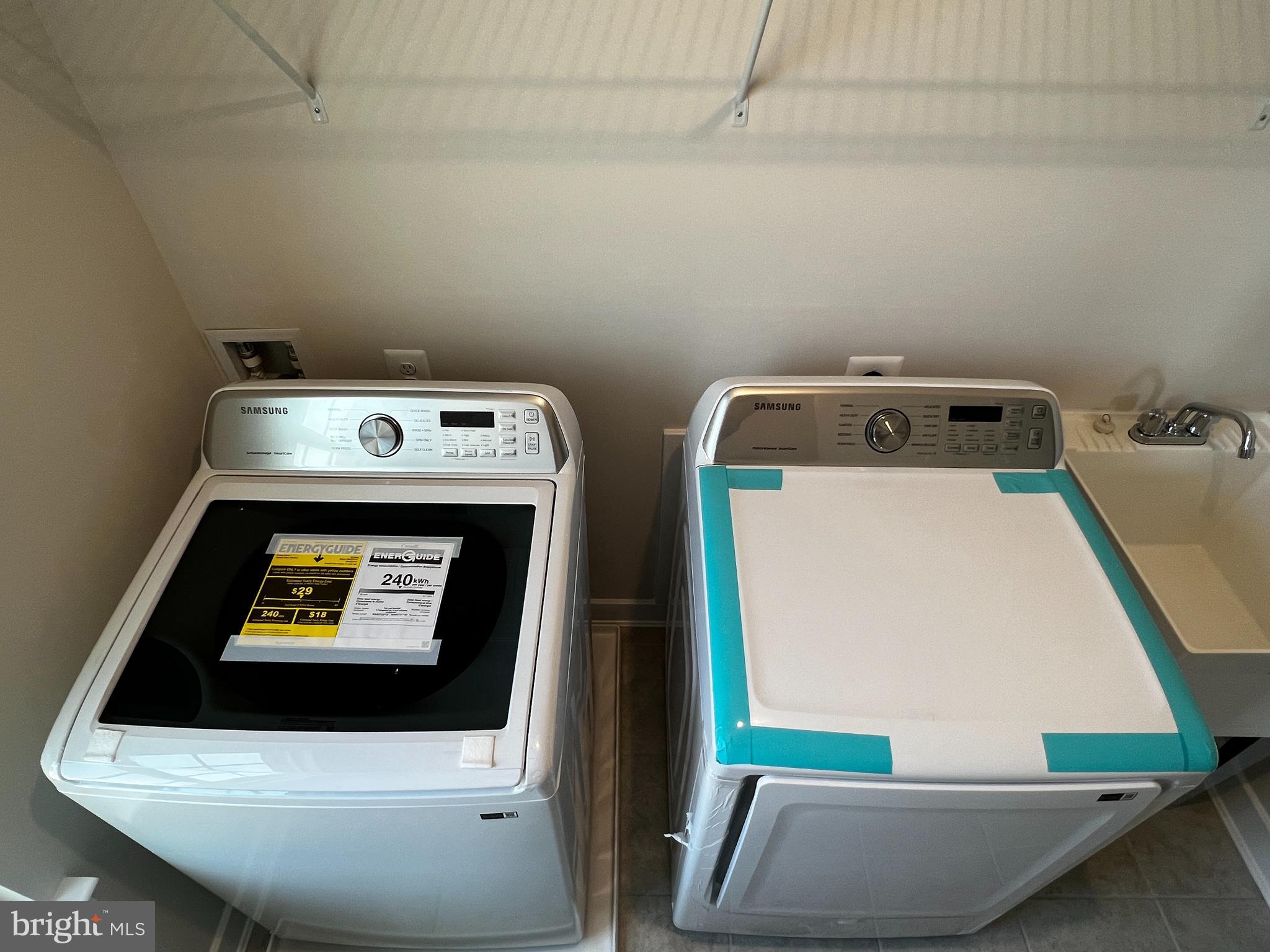 913 Ericcson Lane Middletown, DE 19709 - Photo 50 of 50 a utility room with dryer and washer