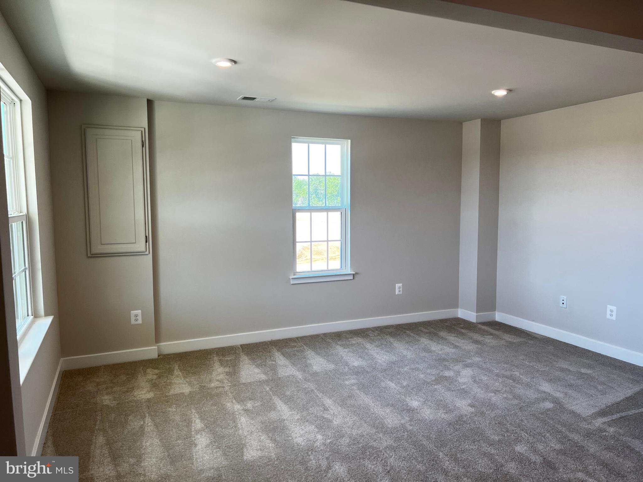 913 Ericcson Lane Middletown, DE 19709 - Photo 9 of 50 an empty room with windows
