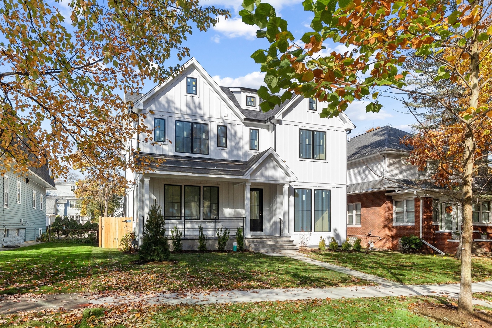 1816 Walnut Avenue Wilmette, IL 60091 - Photo 1 of 22 a front view of a house with a yard