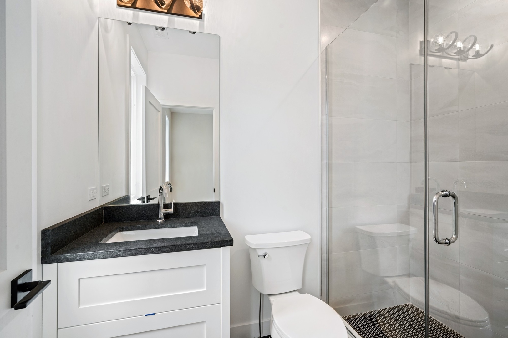 1816 Walnut Avenue Wilmette, IL 60091 - Photo 13 of 22 a bathroom with a sink a toilet and shower