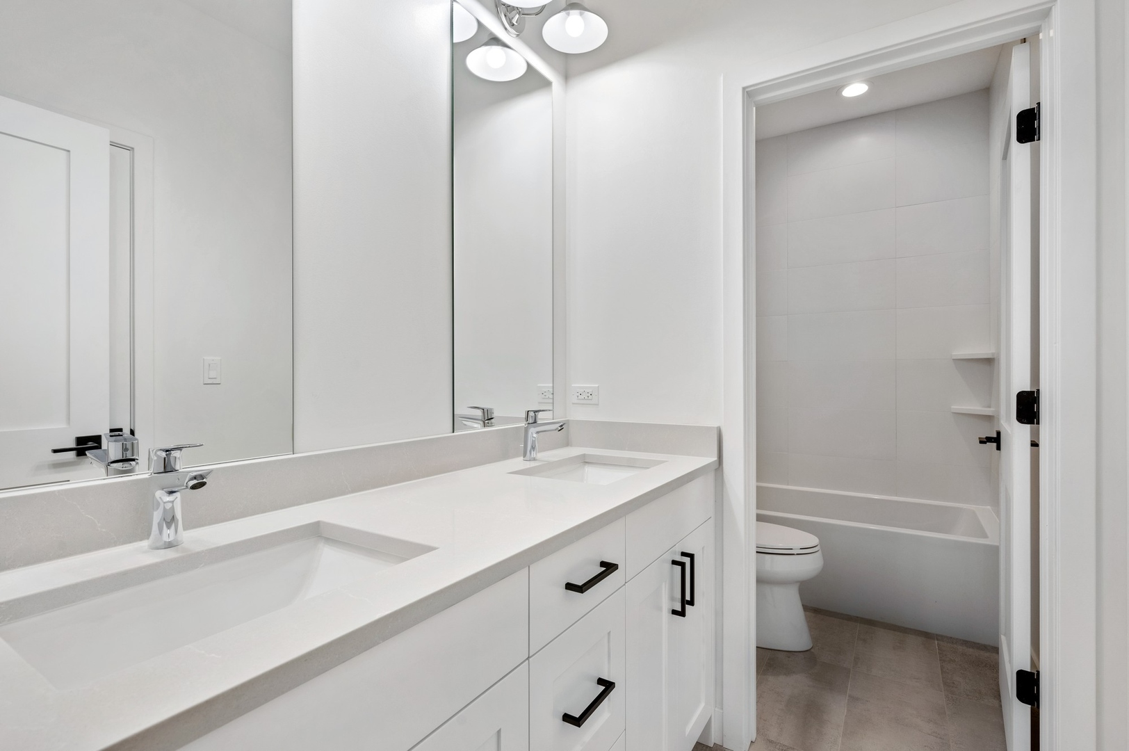 1816 Walnut Avenue Wilmette, IL 60091 - Photo 16 of 22 a bathroom with a granite countertop sink a toilet and bathtub