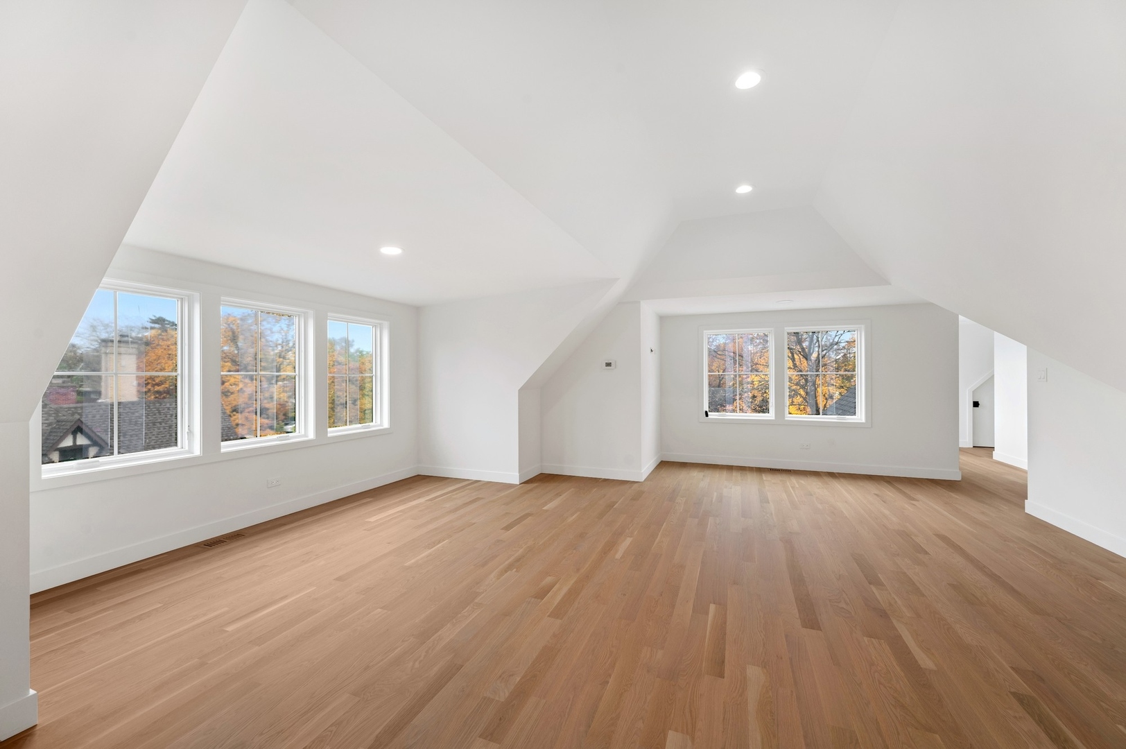 1816 Walnut Avenue Wilmette, IL 60091 - Photo 17 of 22 an empty room with wooden floor and windows