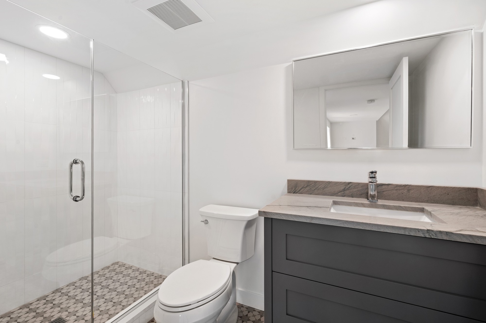 1816 Walnut Avenue Wilmette, IL 60091 - Photo 18 of 22 a bathroom with a sink a toilet and shower