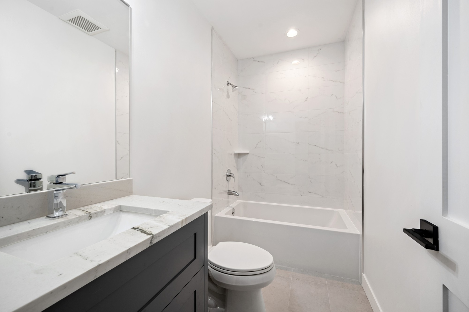 1816 Walnut Avenue Wilmette, IL 60091 - Photo 20 of 22 a bathroom with a sink a toilet and shower