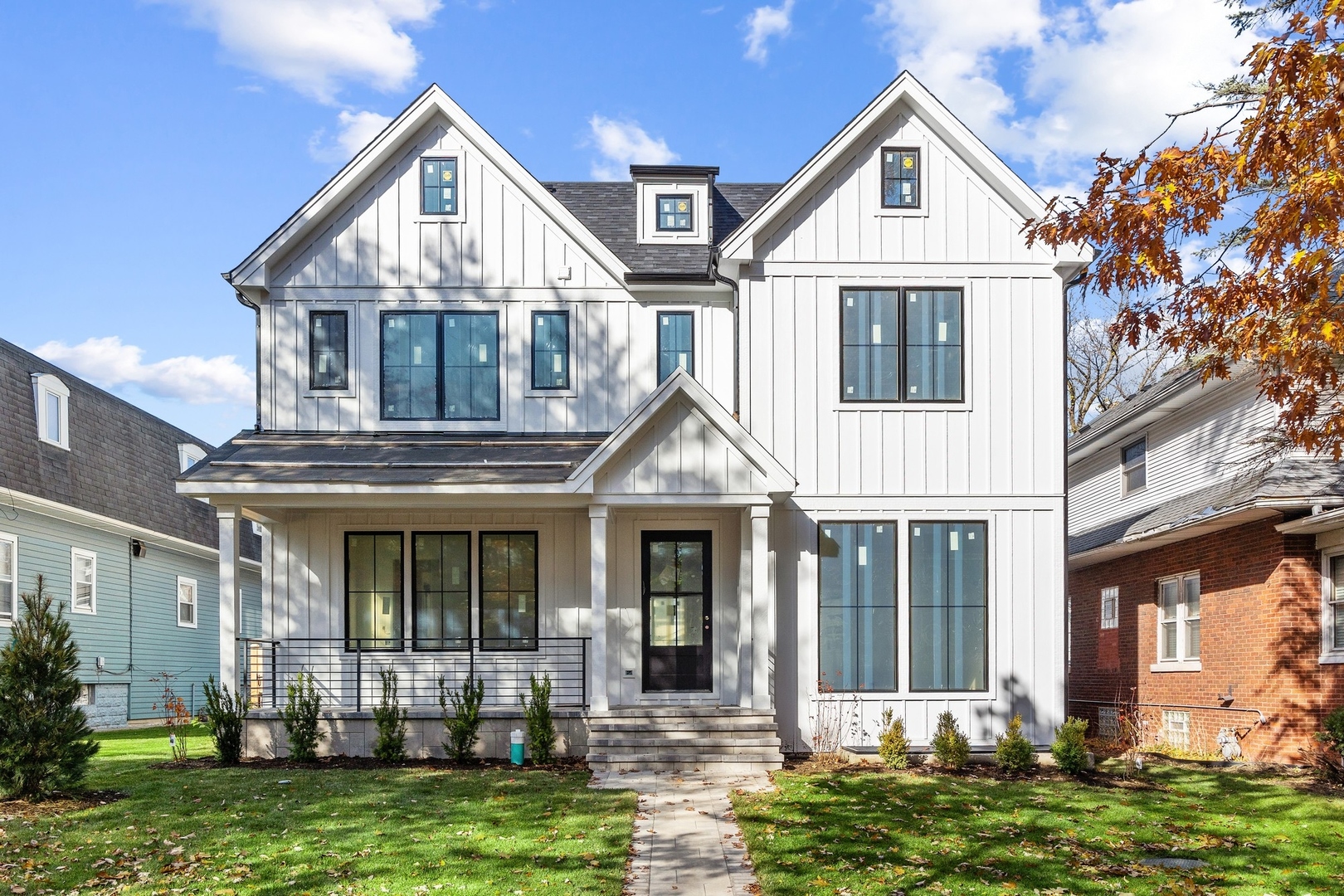 1816 Walnut Avenue Wilmette, IL 60091 - Photo 2 of 22 a front view of a house with a yard