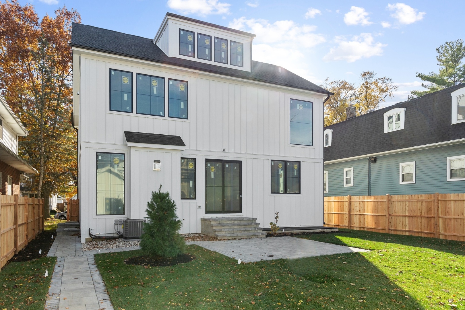 1816 Walnut Avenue Wilmette, IL 60091 - Photo 21 of 22 a front view of a house with a yard and garage