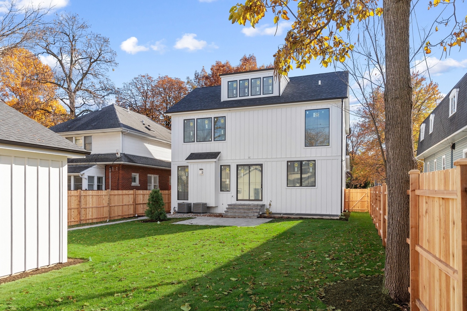 1816 Walnut Avenue Wilmette, IL 60091 - Photo 22 of 22 a front view of a house with a yard and trees