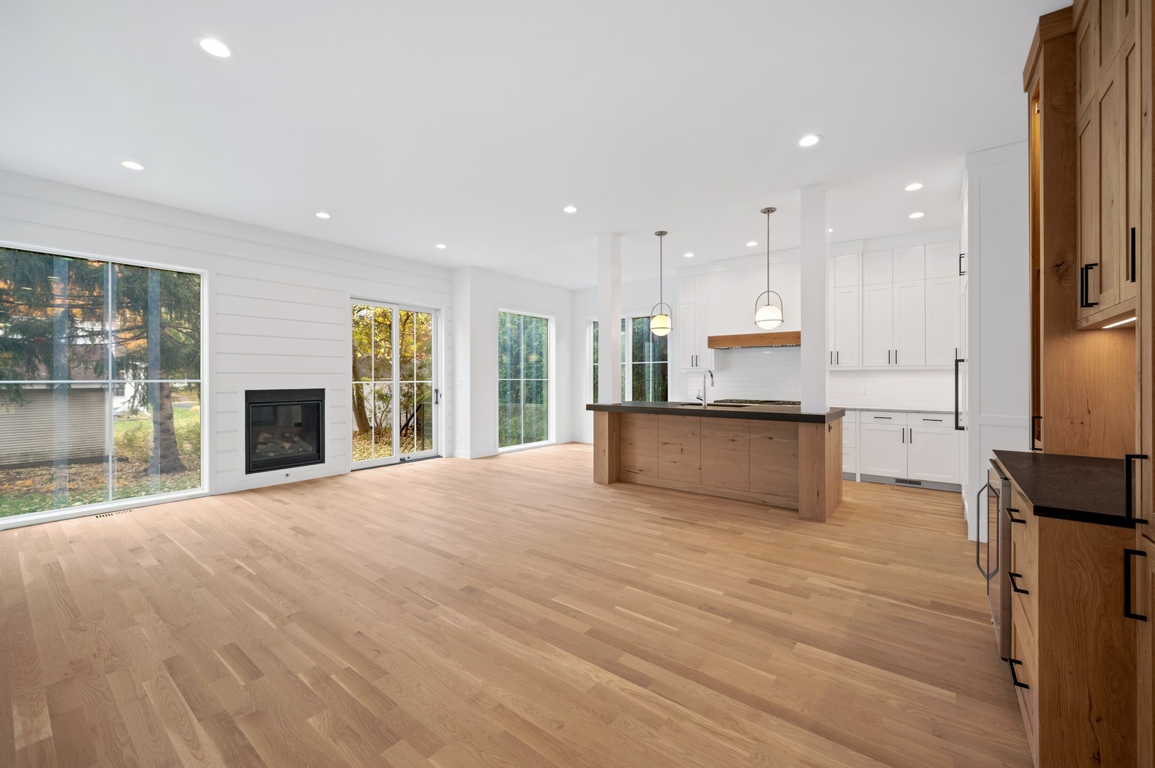 1816 Walnut Avenue Wilmette, IL 60091 - Photo 3 of 22 a view of kitchen with kitchen island granite countertop wooden floor stainless steel appliances and cabinets