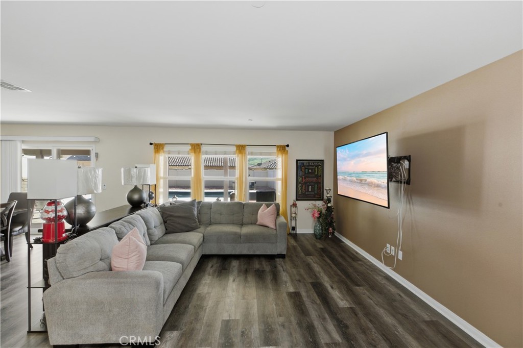 20583 Spring Street Riverside, CA 92507 - Photo 18 of 53 a living room with furniture and a large window