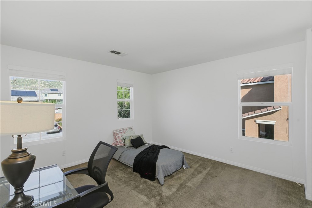 20583 Spring Street Riverside, CA 92507 - Photo 31 of 53 a room with furniture and windows