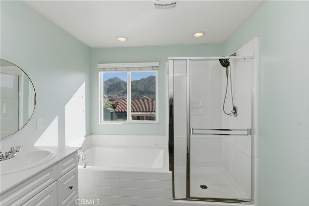 20583 Spring Street Riverside, CA 92507 - Photo 39 of 53 a bathroom with a granite countertop sink a toilet and shower
