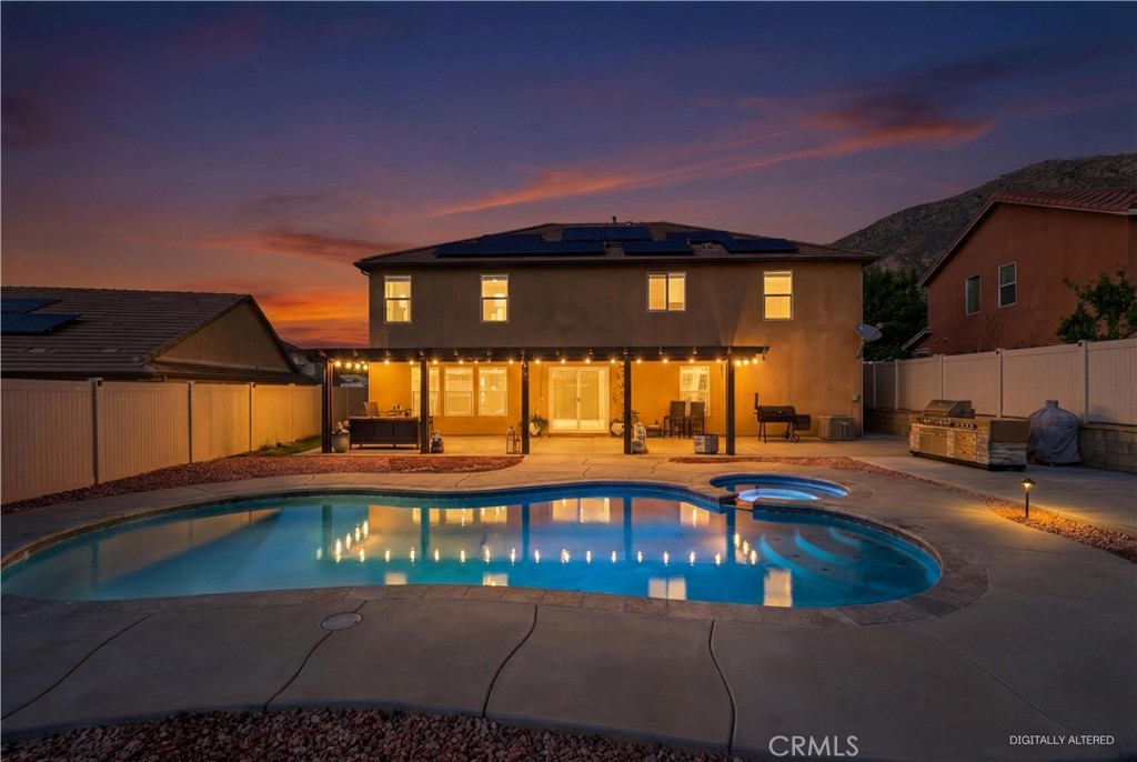 20583 Spring Street Riverside, CA 92507 - Photo 41 of 53 a view of a swimming pool with an outdoor seating