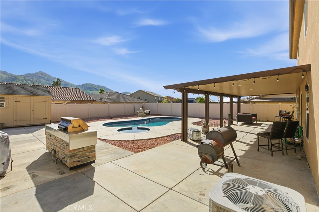 20583 Spring Street Riverside, CA 92507 - Photo 47 of 53 a terrace with outdoor seating and city view