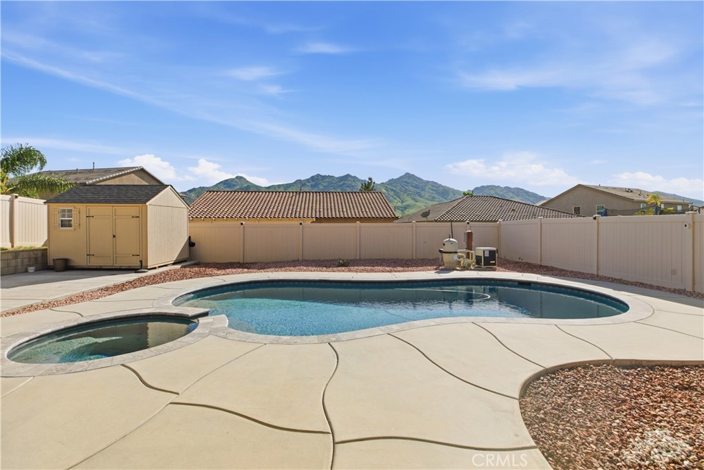 20583 Spring Street Riverside, CA 92507 - Photo 49 of 53 a view of a backyard with a tub and mountain view
