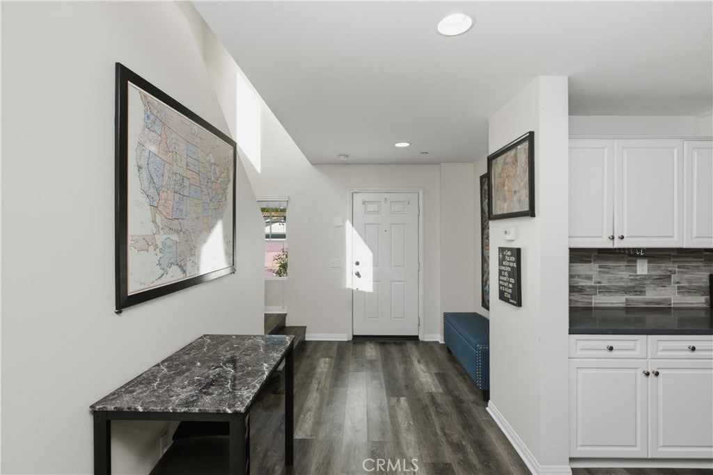 20583 Spring Street Riverside, CA 92507 - Photo 10 of 53 a view of kitchen with furniture and wooden floor