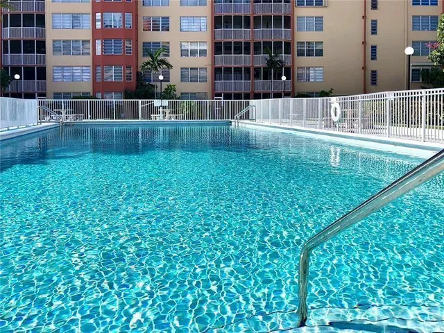 a view of balcony with a yard and plants