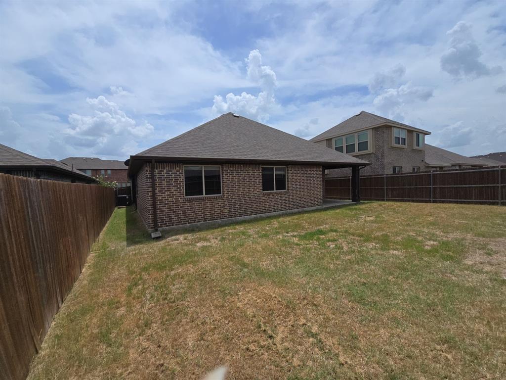 4031 Three Forks Road Kaufman, TX 75142 - Photo 24 of 26 a house with trees in the background