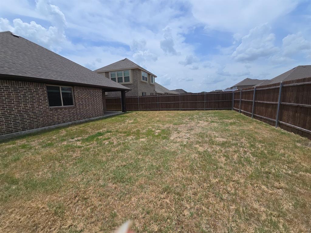 4031 Three Forks Road Kaufman, TX 75142 - Photo 25 of 26 a house with yard in front of it