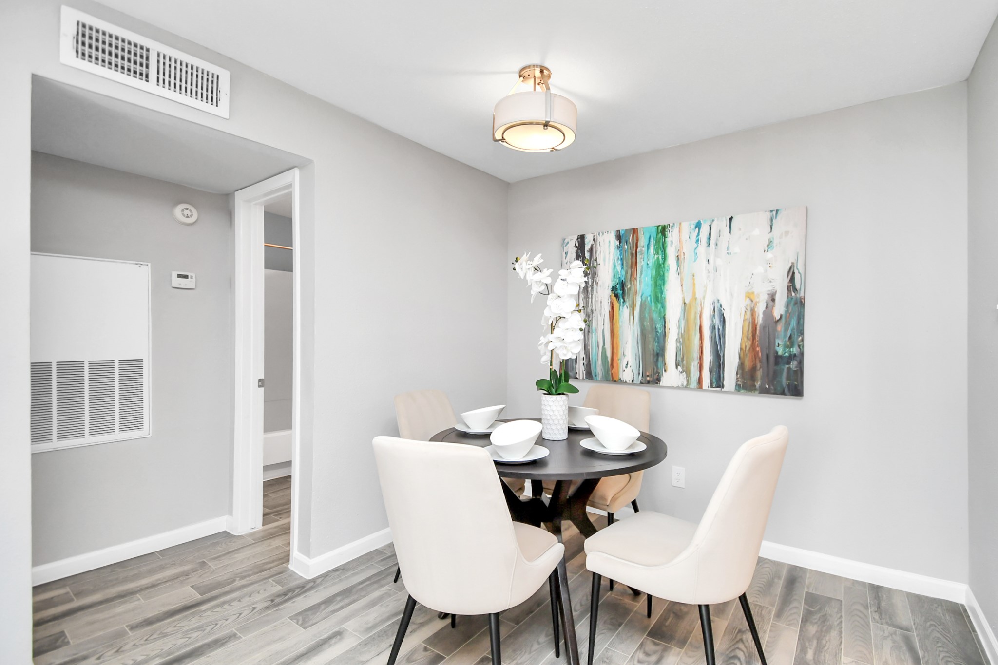 2701 West Bellfort Avenue, Unit 1016 Houston, TX 77054 - Photo 5 of 44 a view of a dining room with furniture window and wooden floor