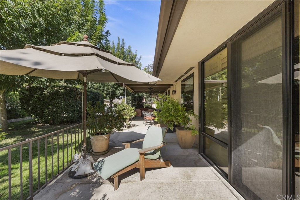 6272 Tecate Drive Riverside, CA 92506 - Photo 37 of 39 a patio with glass top table and chairs