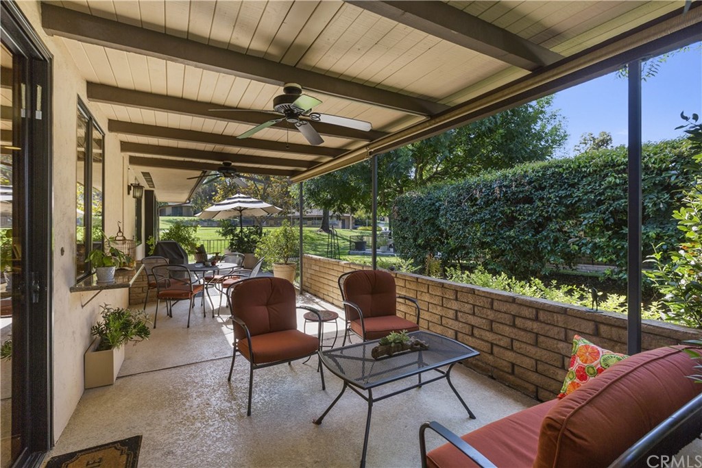 6272 Tecate Drive Riverside, CA 92506 - Photo 38 of 39 a view of chair and table in patio with wooden fence