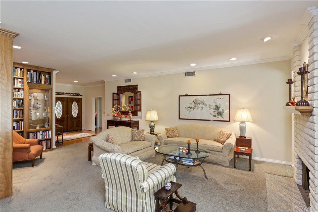 6272 Tecate Drive Riverside, CA 92506 - Photo 8 of 39 a living room with furniture and a lamp