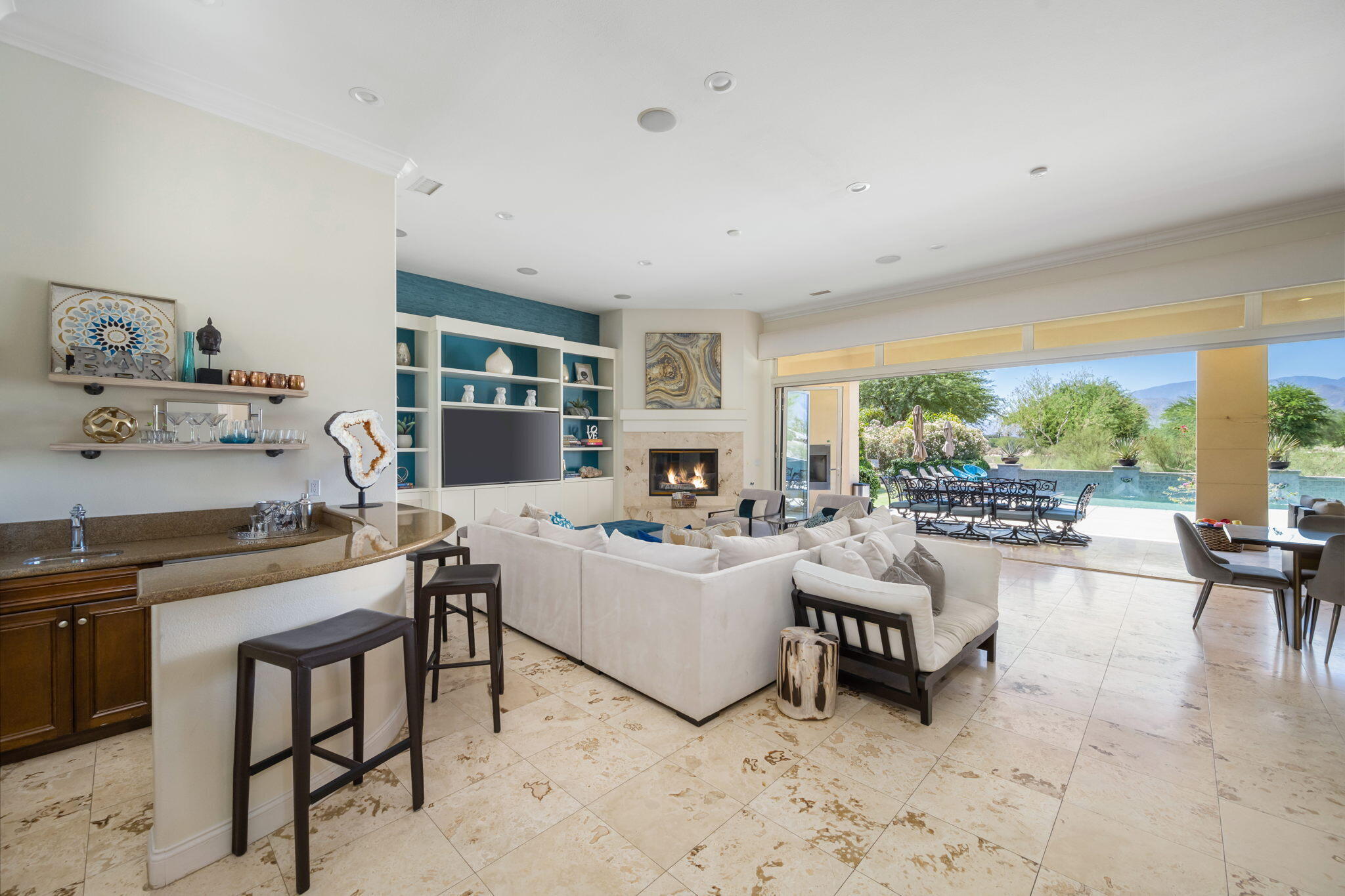 81785 Brown Deer Park La Quinta, CA 92253 - Photo 11 of 57 a living room with furniture and a table