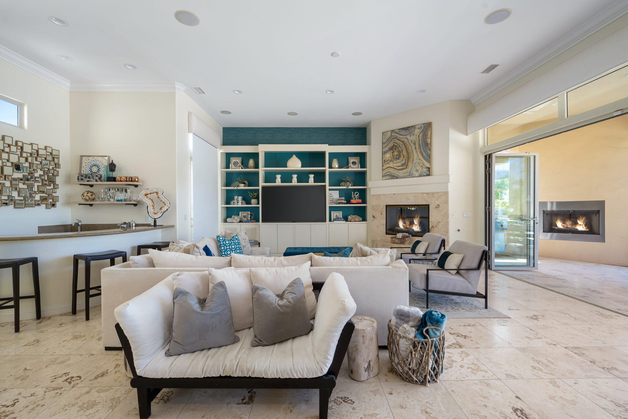 81785 Brown Deer Park La Quinta, CA 92253 - Photo 16 of 57 a living room with furniture and a fireplace