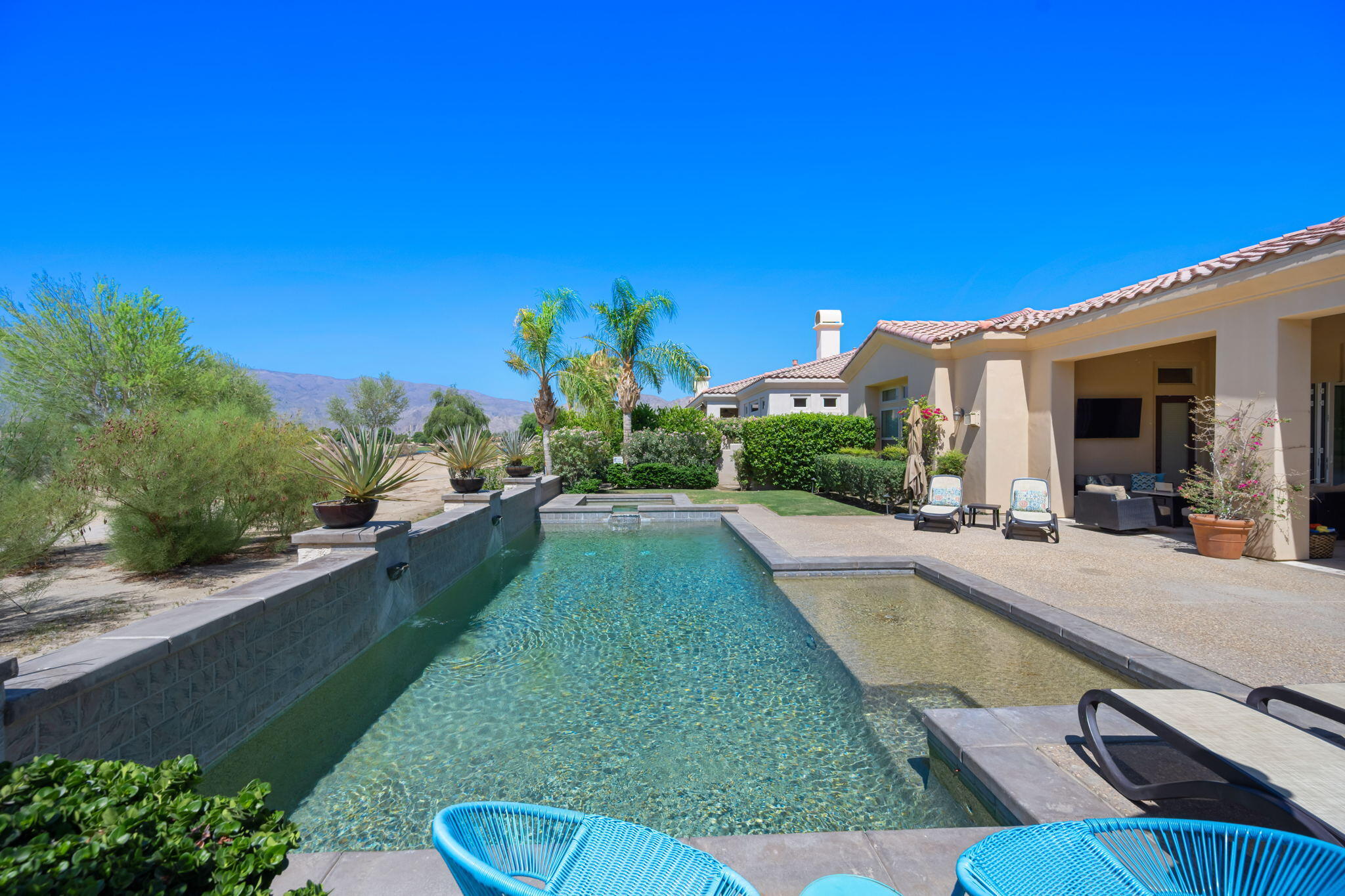 81785 Brown Deer Park La Quinta, CA 92253 - Photo 23 of 57 a view of a house with pool porch and furniture
