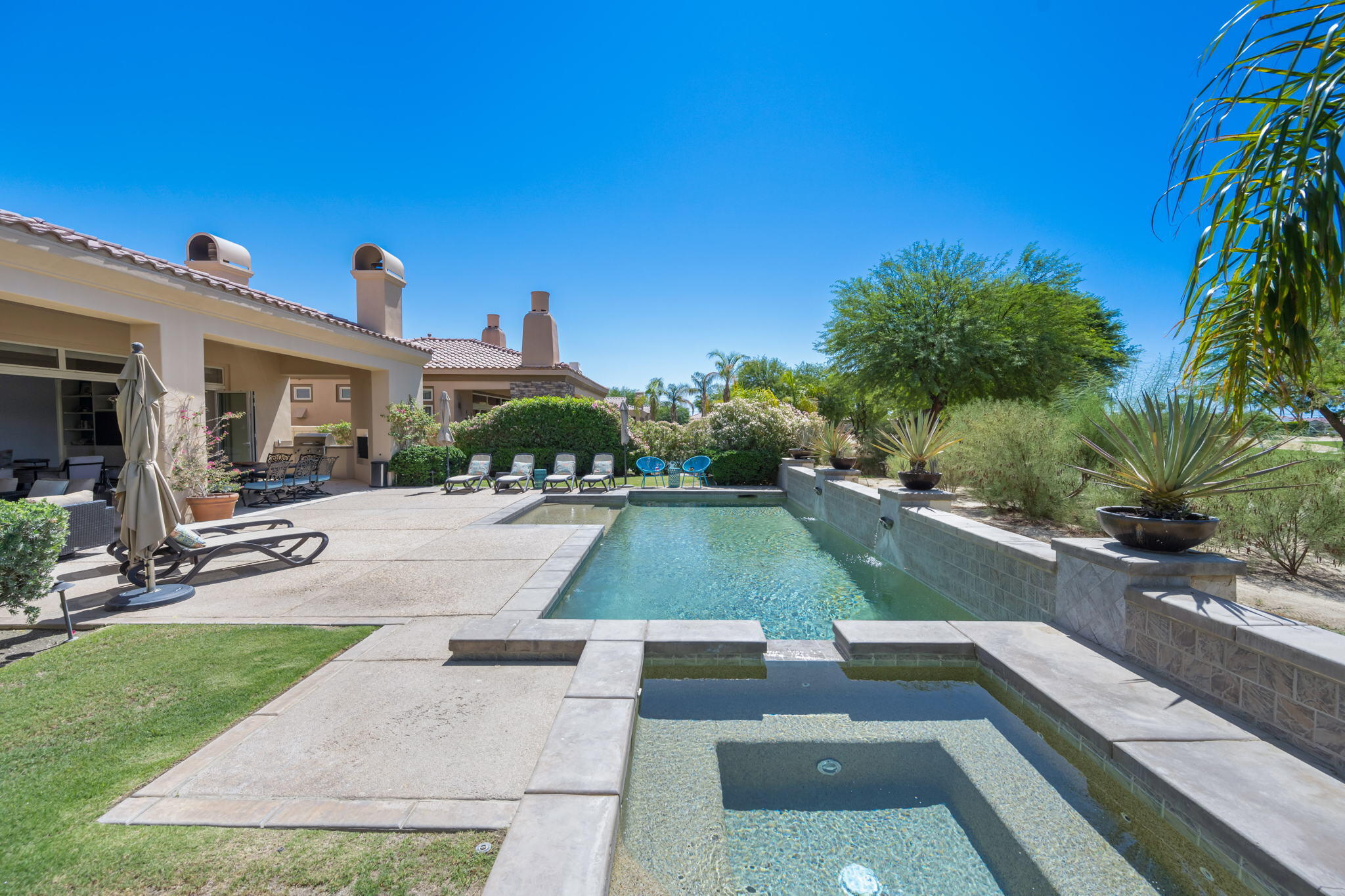 81785 Brown Deer Park La Quinta, CA 92253 - Photo 25 of 57 a view of a house with a swimming pool