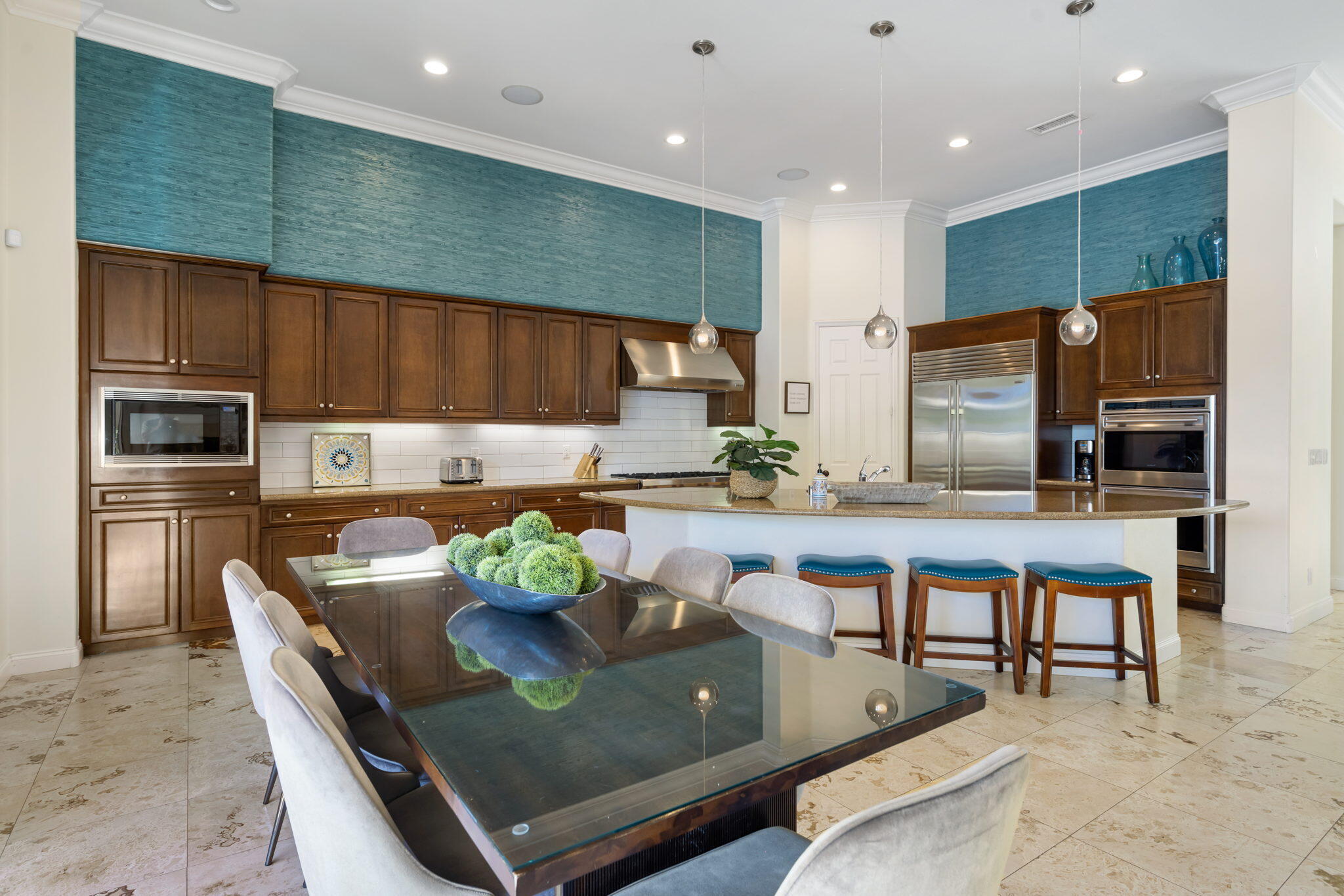 81785 Brown Deer Park La Quinta, CA 92253 - Photo 28 of 57 a kitchen with stainless steel appliances granite countertop a sink and a refrigerator