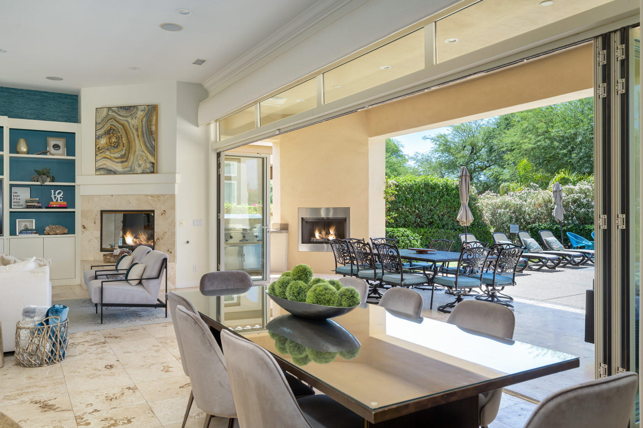 81785 Brown Deer Park La Quinta, CA 92253 - Photo 34 of 57 a living room with fireplace furniture and a large window