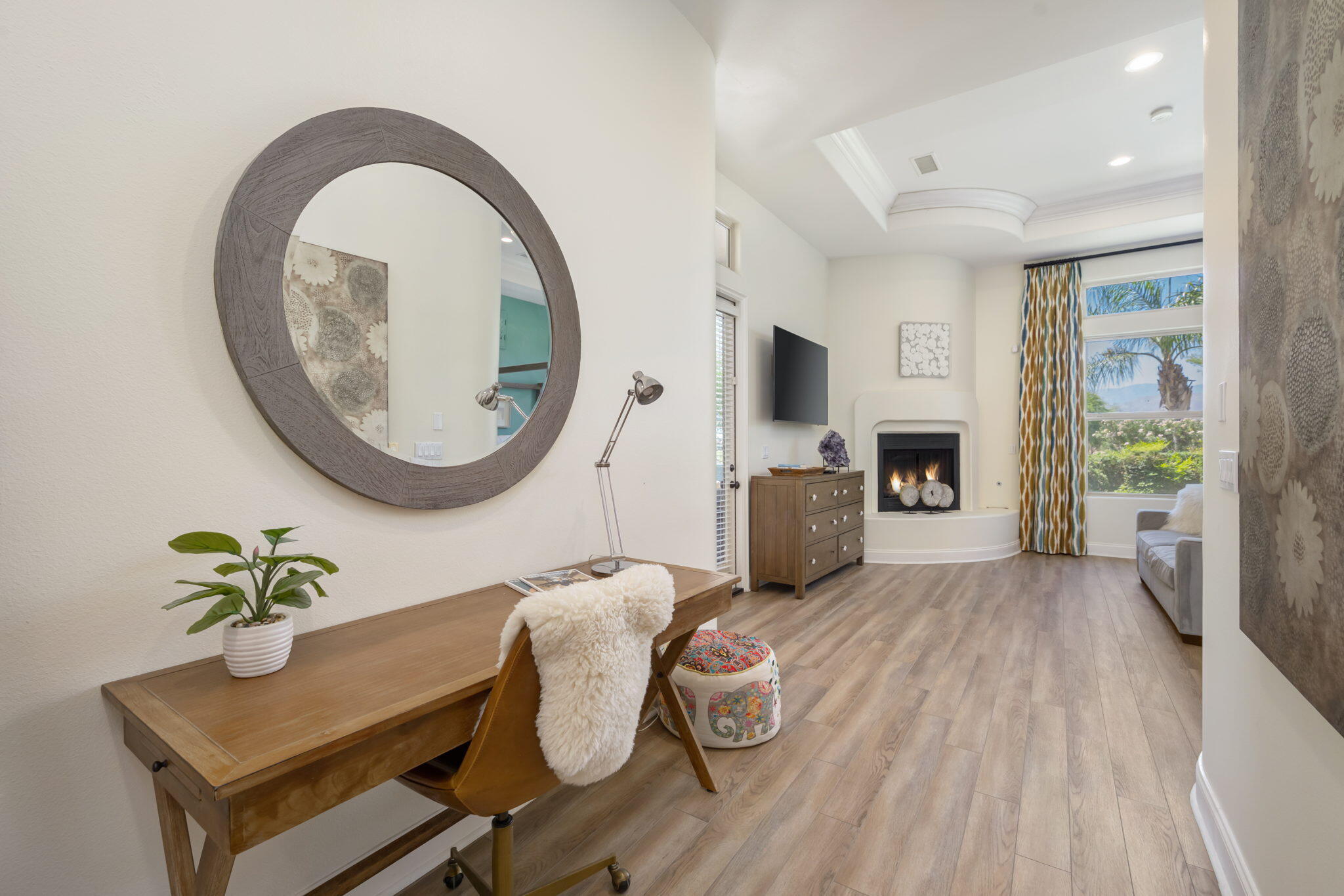 81785 Brown Deer Park La Quinta, CA 92253 - Photo 38 of 57 a living room with furniture a mirror and a table