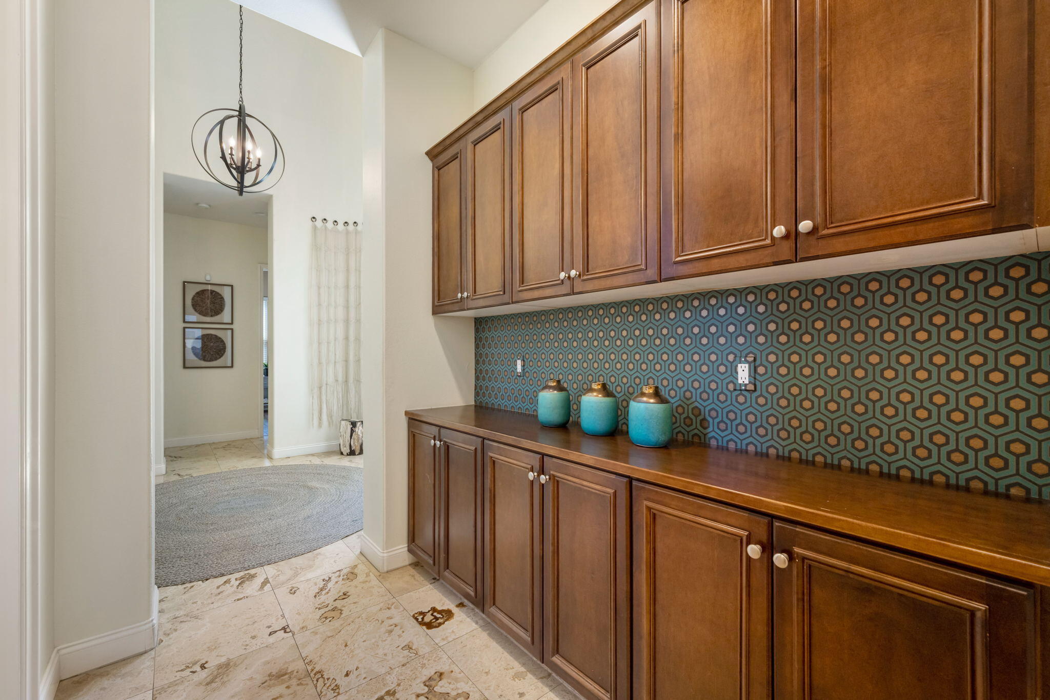 81785 Brown Deer Park La Quinta, CA 92253 - Photo 45 of 57 a kitchen with stainless steel appliances a refrigerator and cabinets