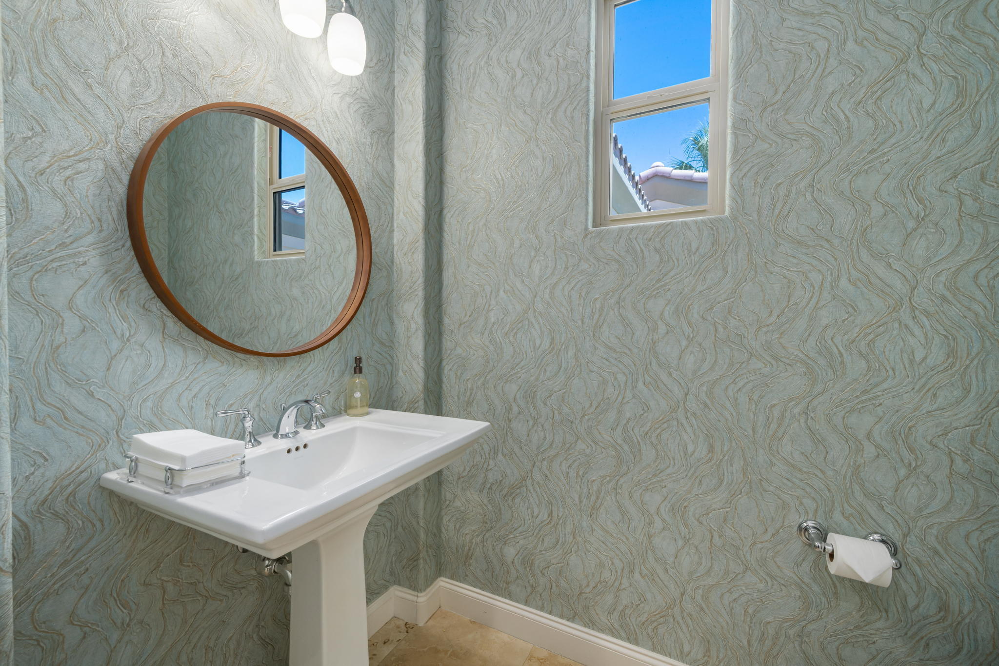 81785 Brown Deer Park La Quinta, CA 92253 - Photo 46 of 57 a bathroom with a sink and a mirror
