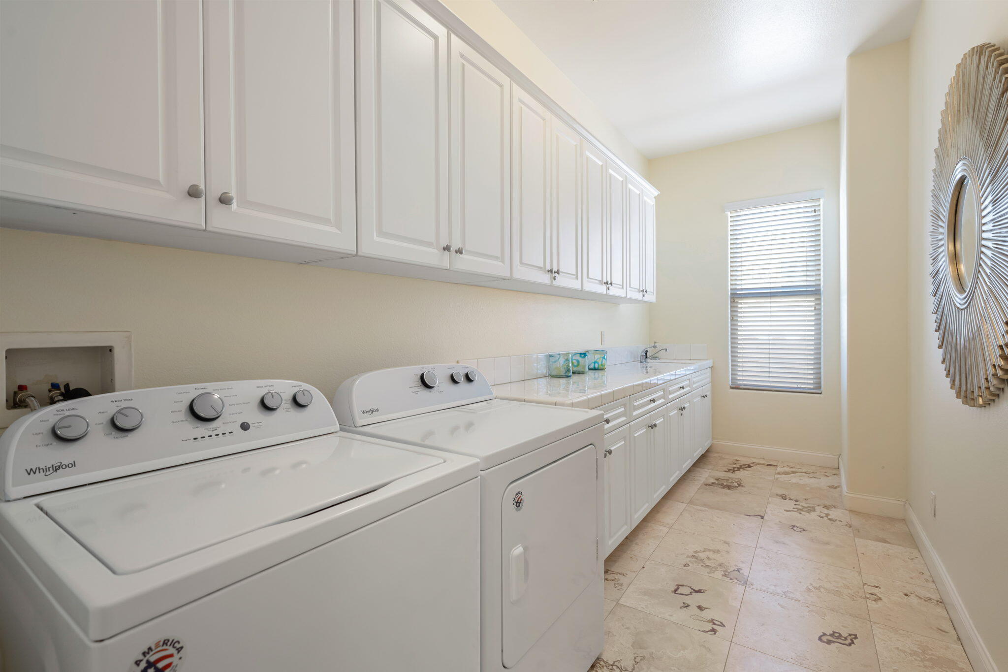 81785 Brown Deer Park La Quinta, CA 92253 - Photo 49 of 57 a utility room with dryer and washer