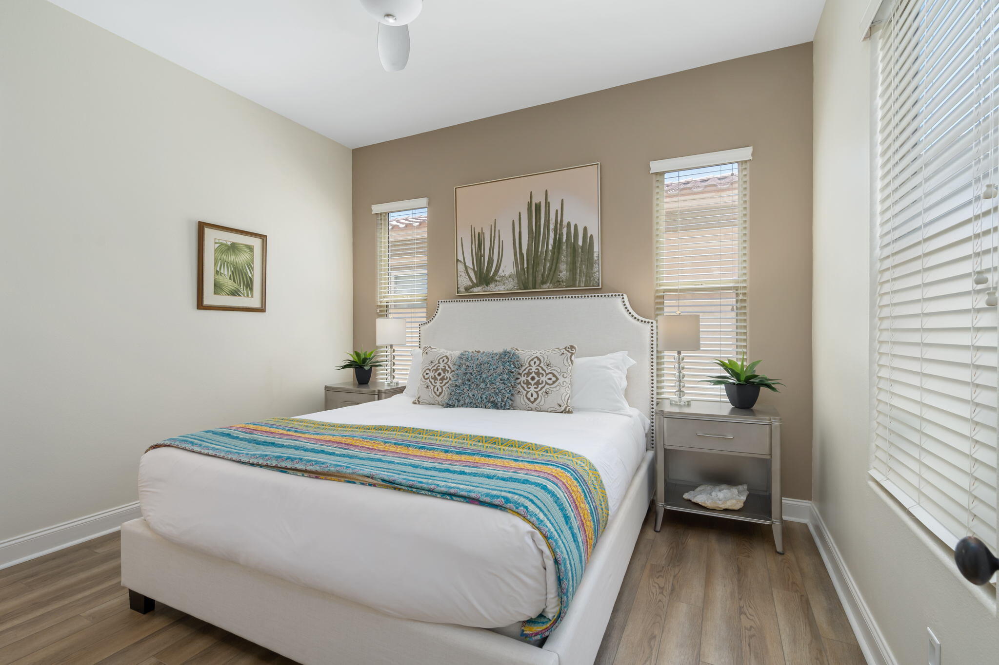 81785 Brown Deer Park La Quinta, CA 92253 - Photo 50 of 57 a bedroom with a bed and a painting on the wall