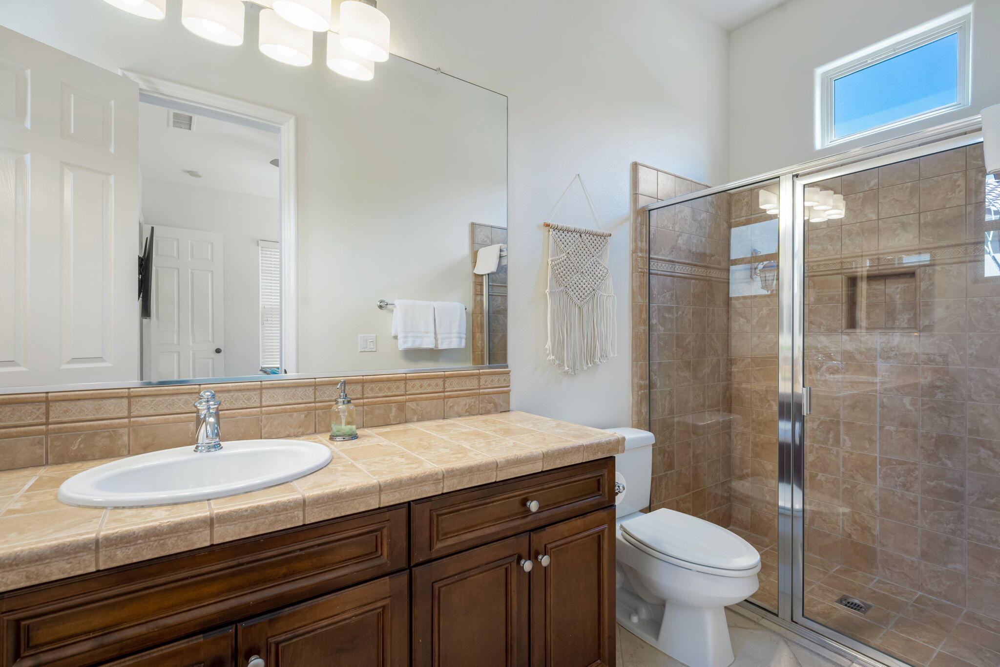 81785 Brown Deer Park La Quinta, CA 92253 - Photo 51 of 57 a bathroom with a sink and a mirror
