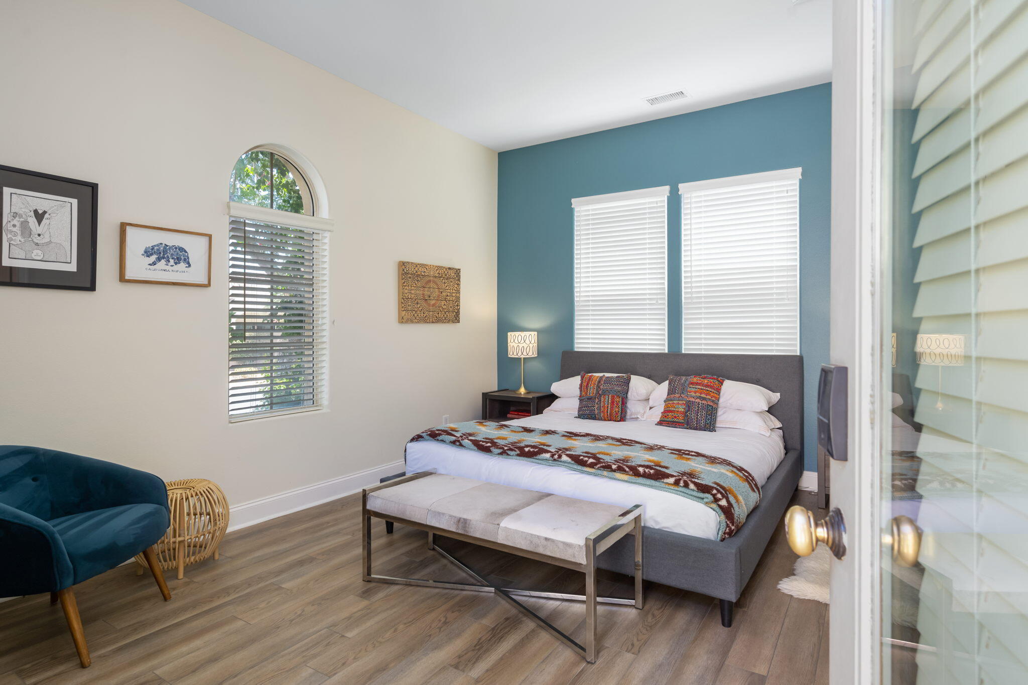 81785 Brown Deer Park La Quinta, CA 92253 - Photo 52 of 57 a bedroom with a bed wooden floor and a window