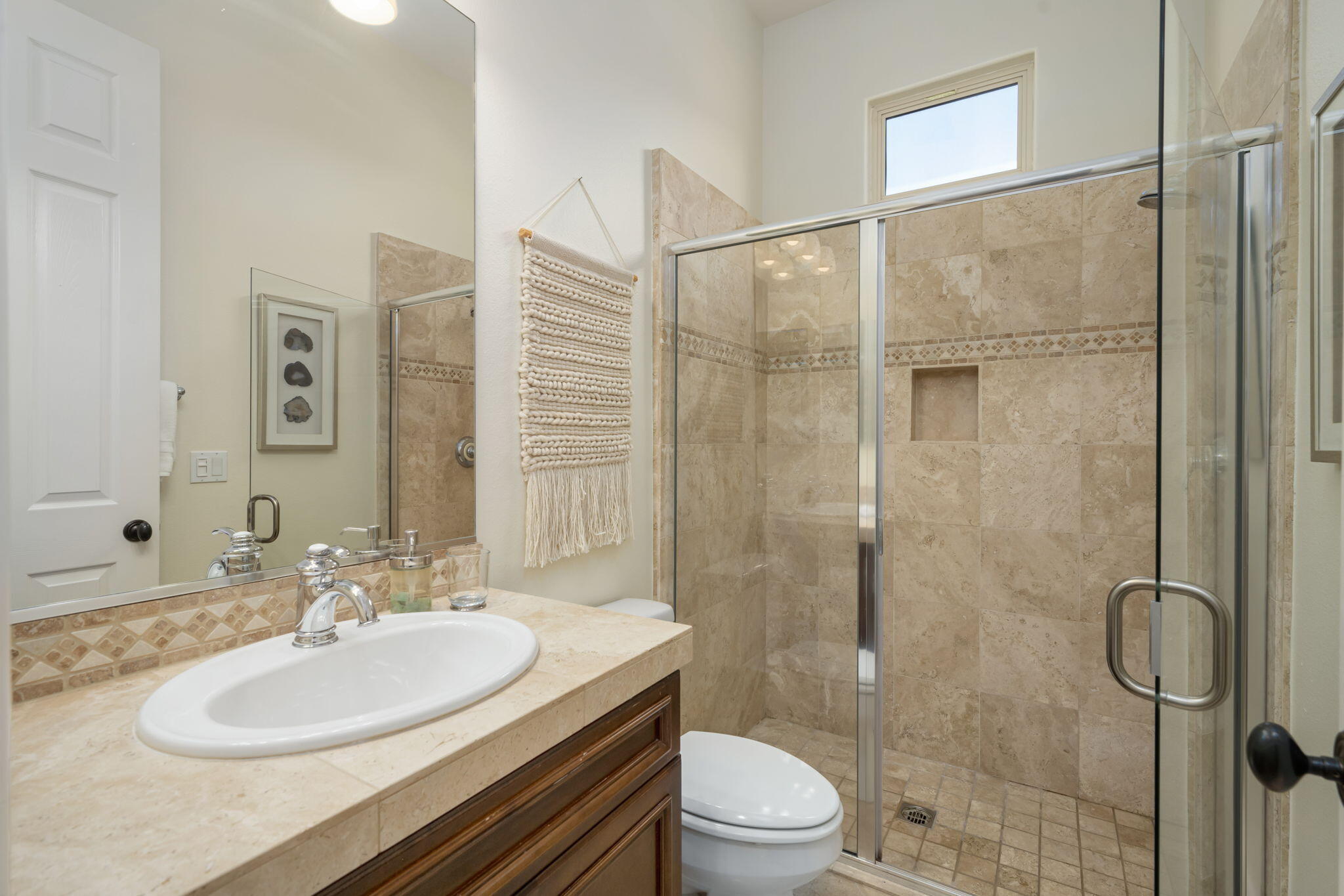 81785 Brown Deer Park La Quinta, CA 92253 - Photo 55 of 57 a bathroom with a sink toilet and shower