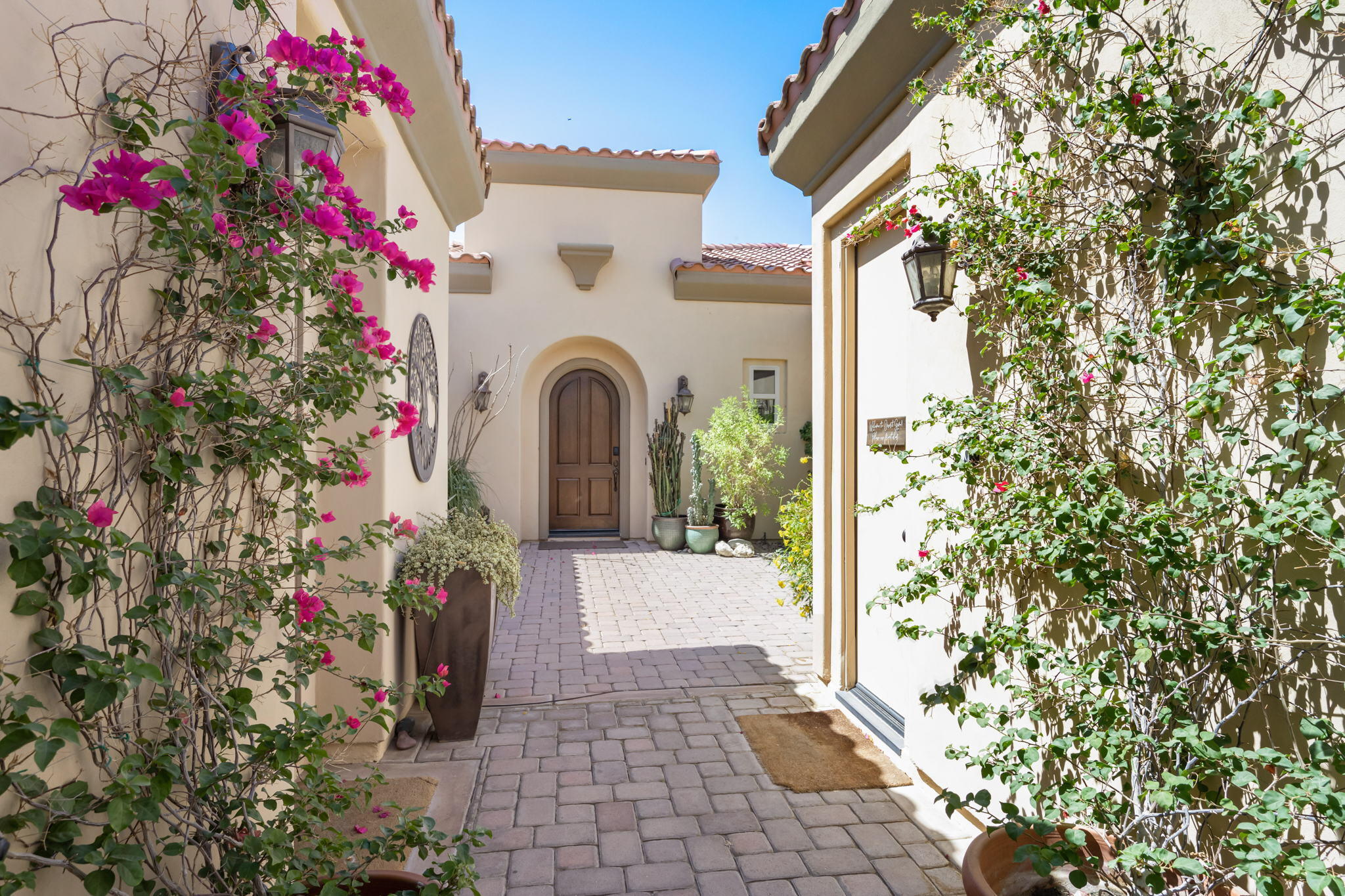 81785 Brown Deer Park La Quinta, CA 92253 - Photo 7 of 57 a front view of a house with a porch