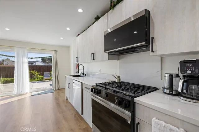 a bedroom with a bed and a mirror