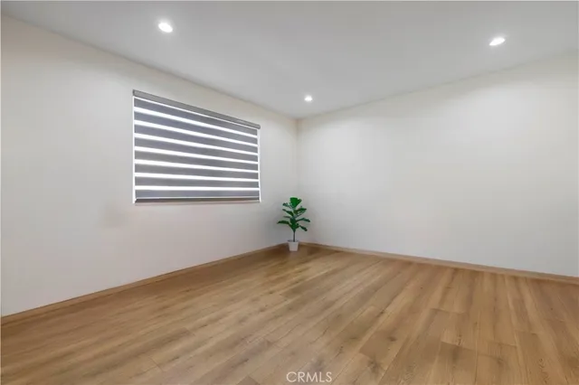 a living room with furniture flat screen tv and a fireplace