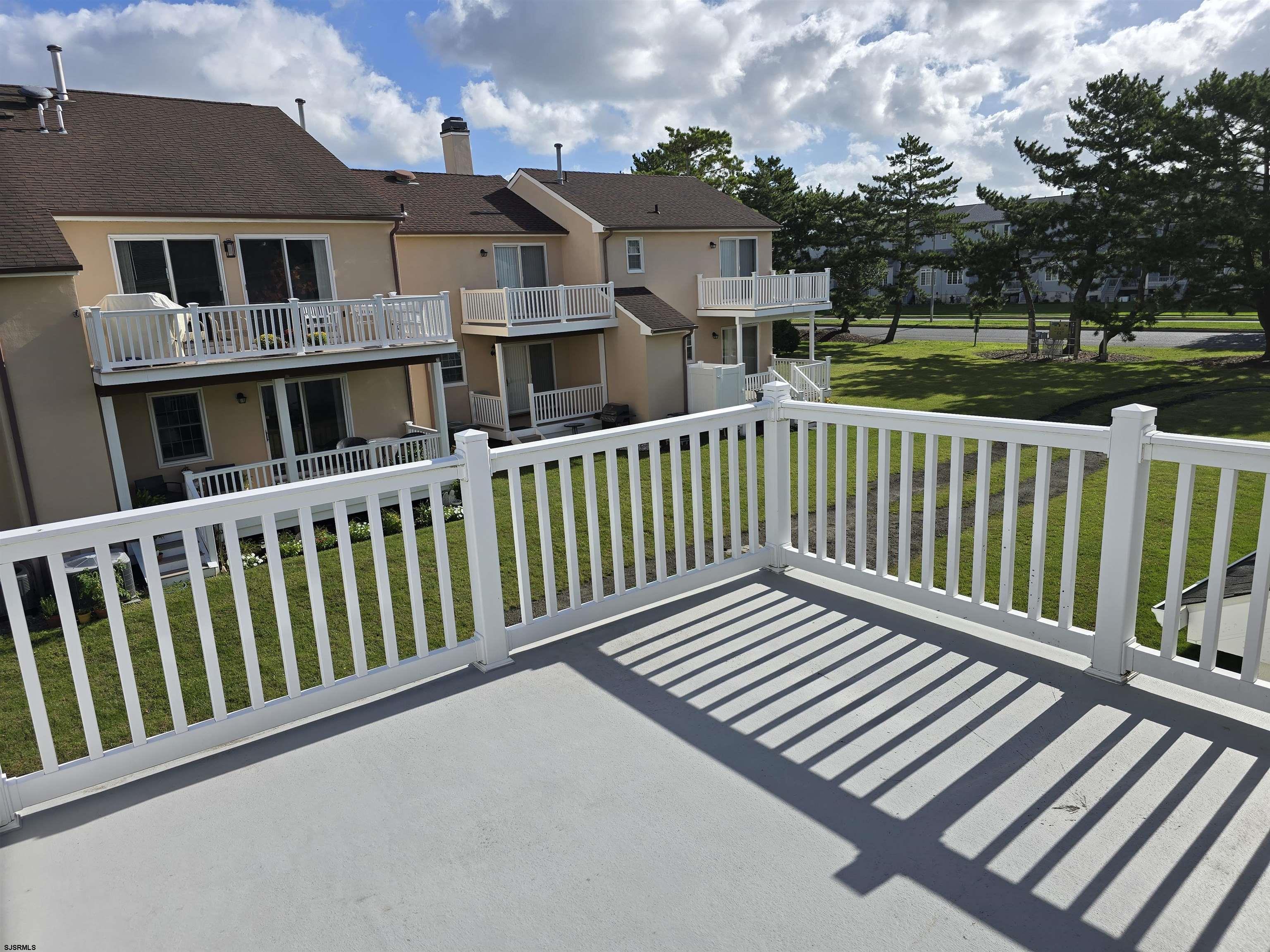 9 Gull Cove Brigantine, NJ 08203 - Photo 7 of 20 a view of a house with a deck
